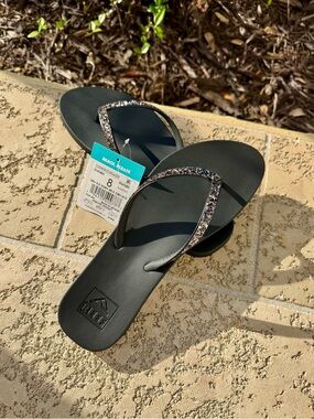 NWT Reef Cushion Stargazer Flip Flops – Women’s Size 8 – Black/Bronze